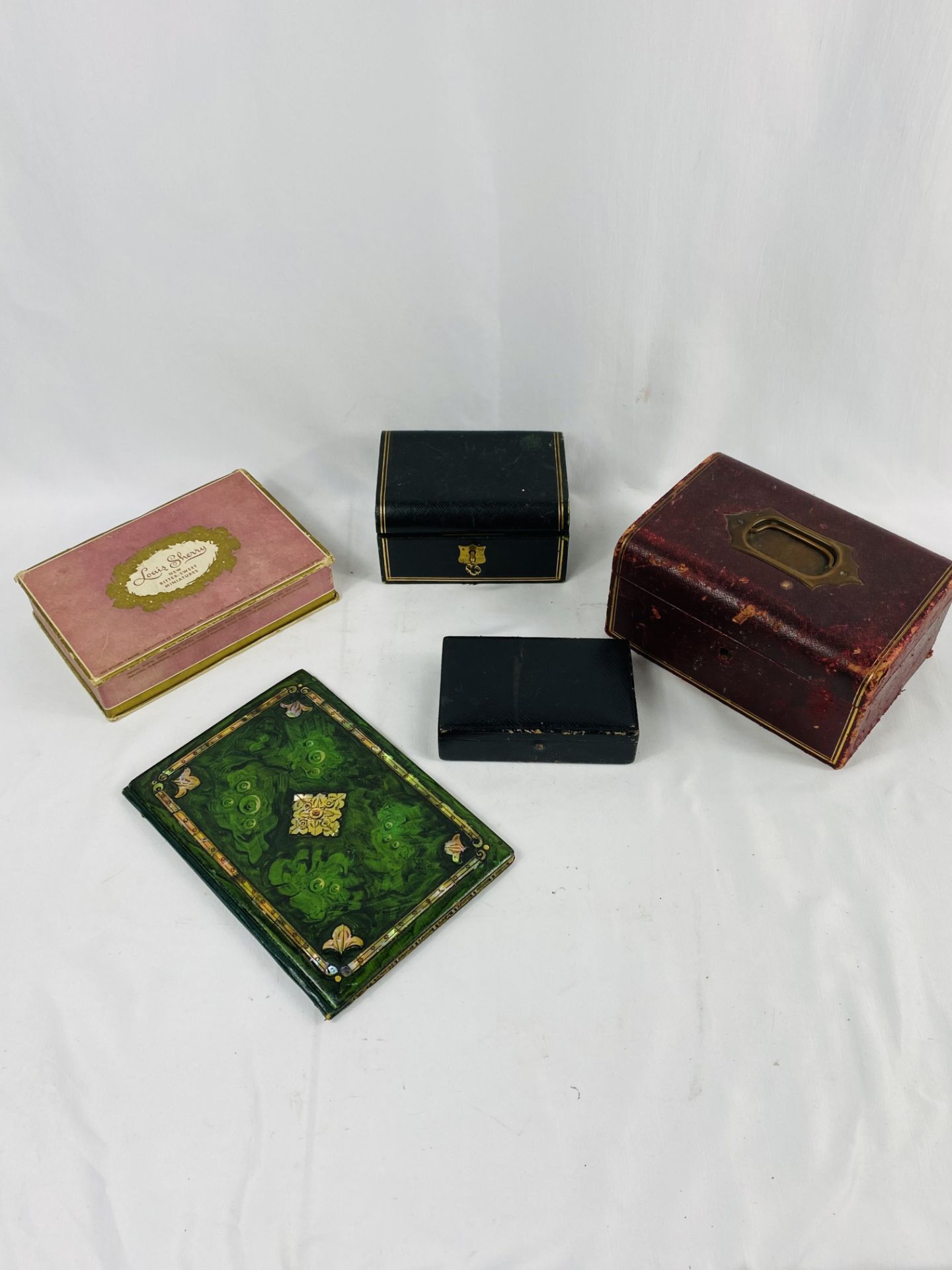 Three jewellery boxes containing a quantity of costume jewellery