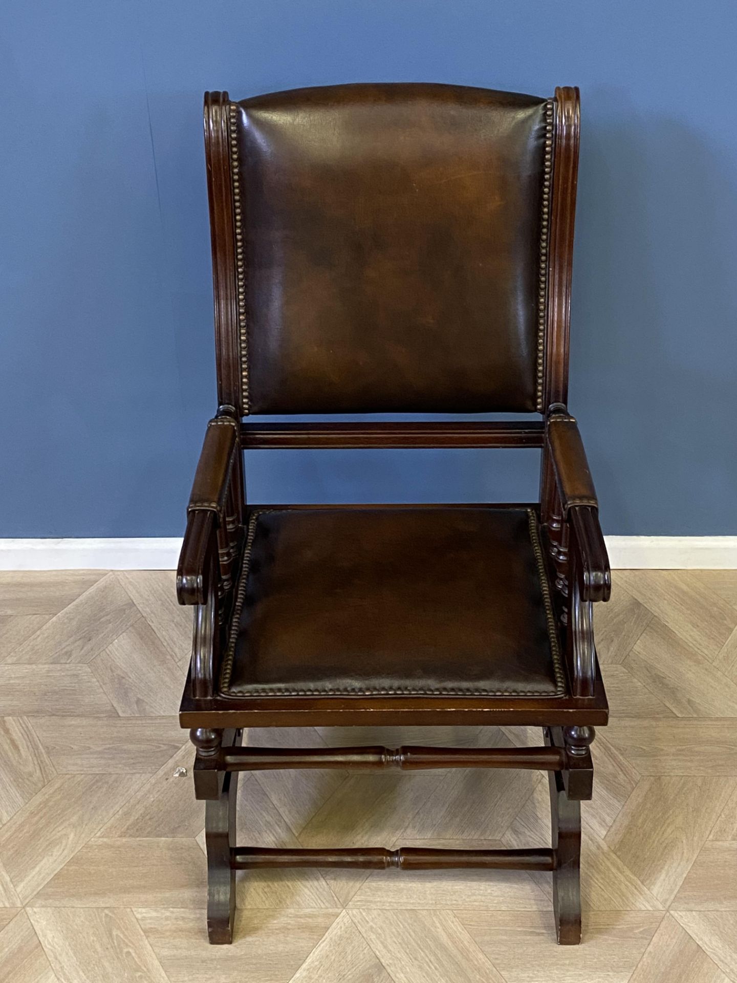 Mahogany framed leather rocking chair