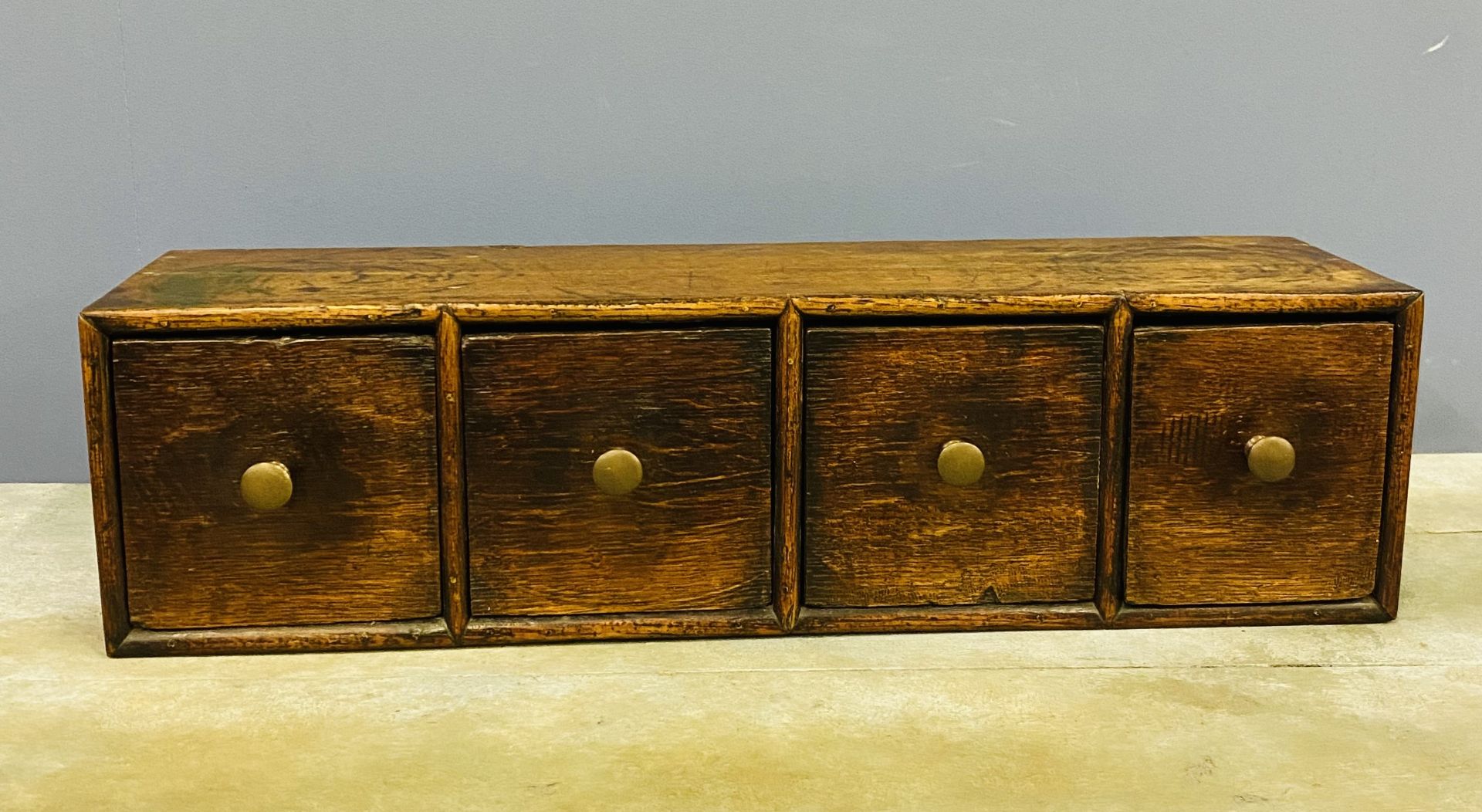 Antique oak bank of spice drawers