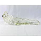 Glass sculpture of reclining lovers