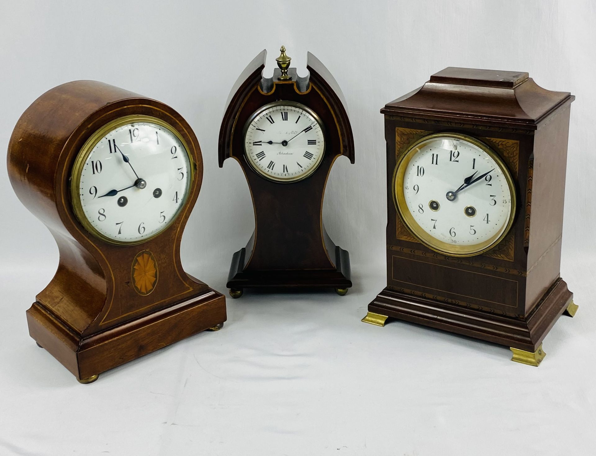 Three mahogany mantel clocks