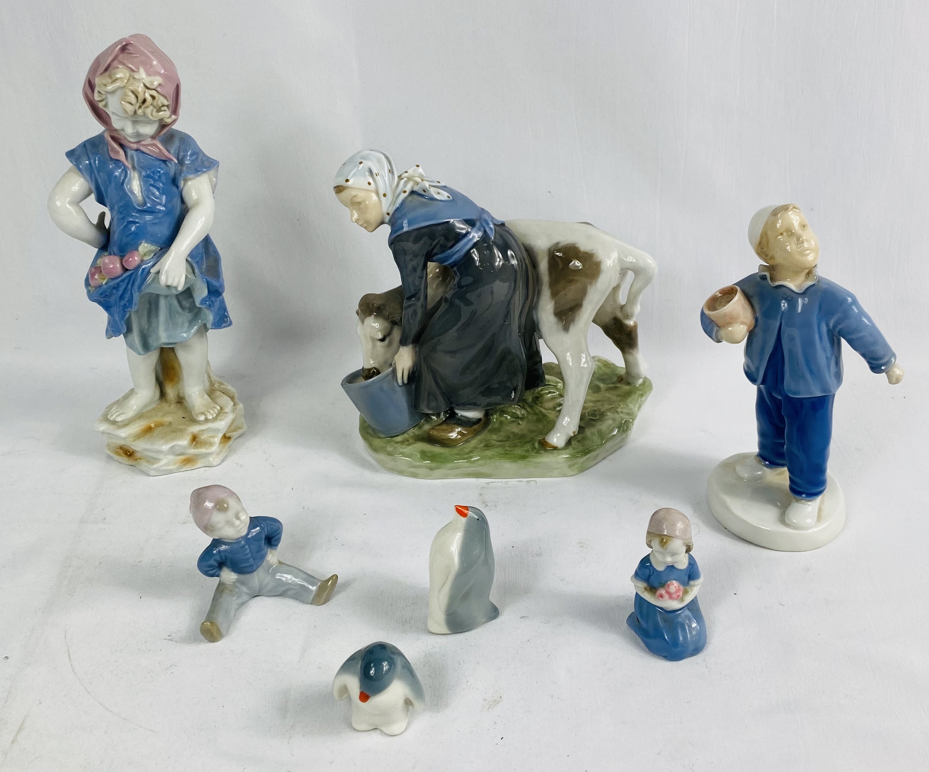 Royal Copenhagen figurine of a lady together with five others