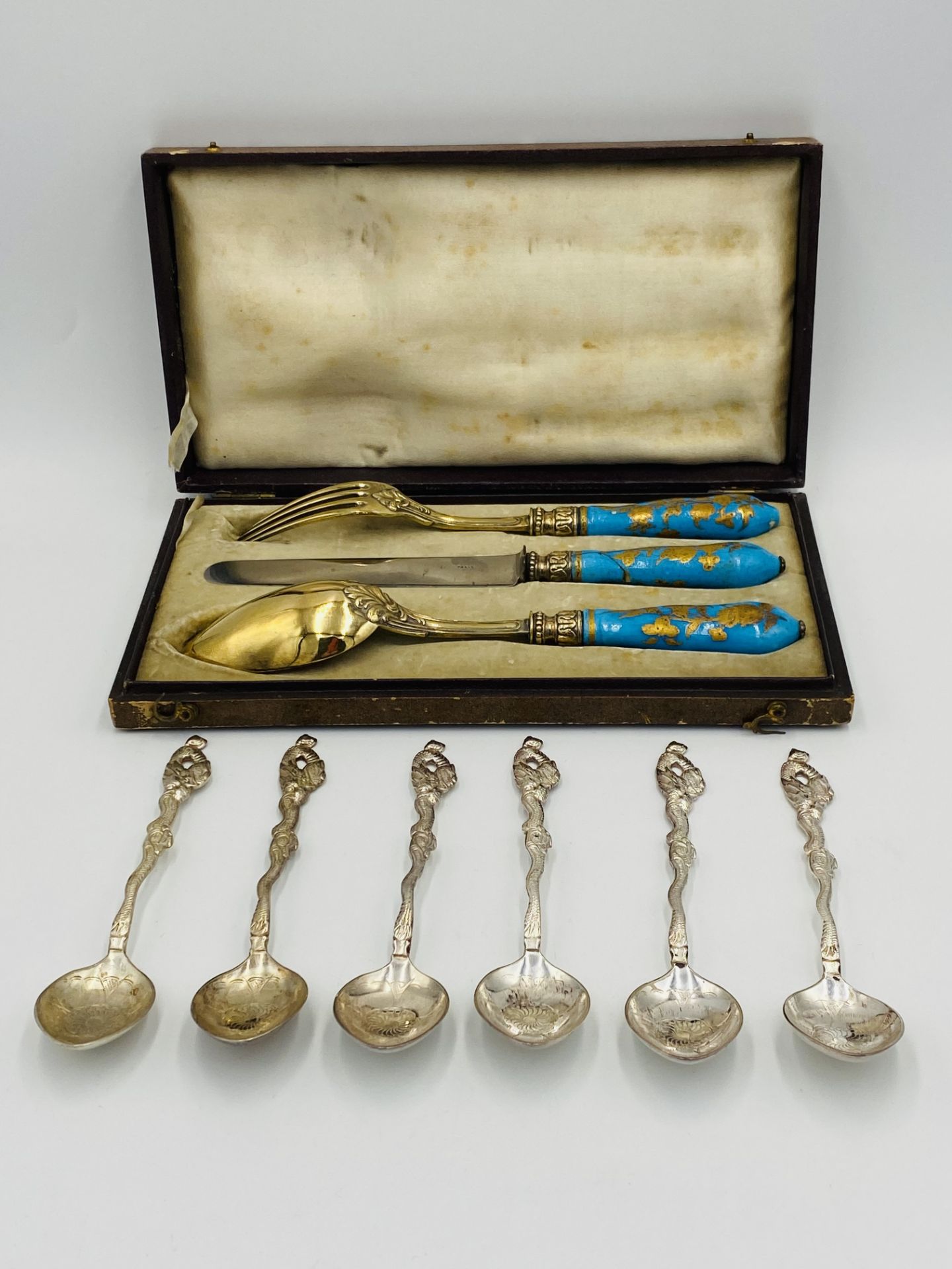 Set of six silver tea spoons and other items