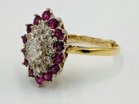 9ct gold ring set with diamonds and pink sapphires