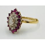 9ct gold ring set with diamonds and pink sapphires