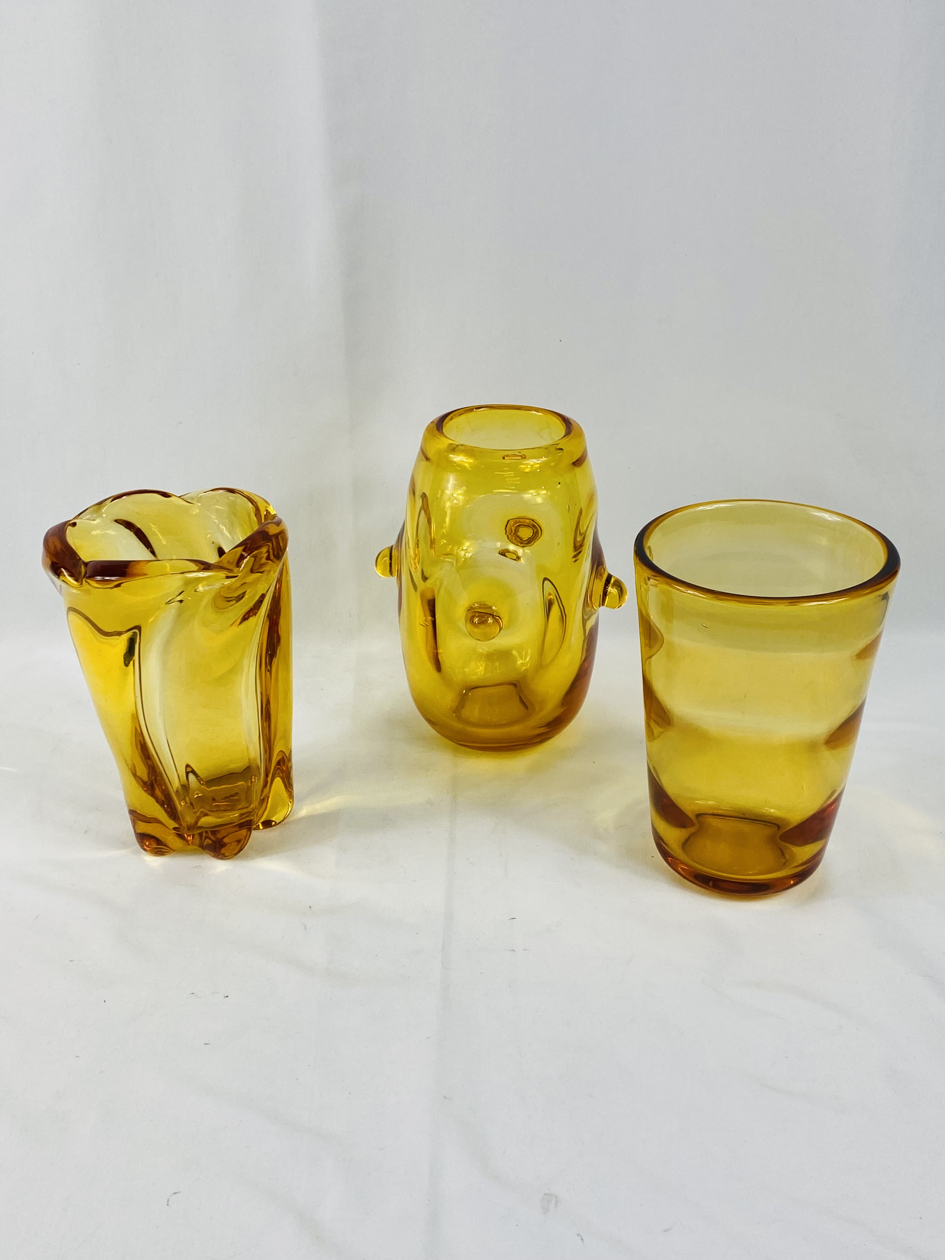 Three amber coloured Whitefriars vases