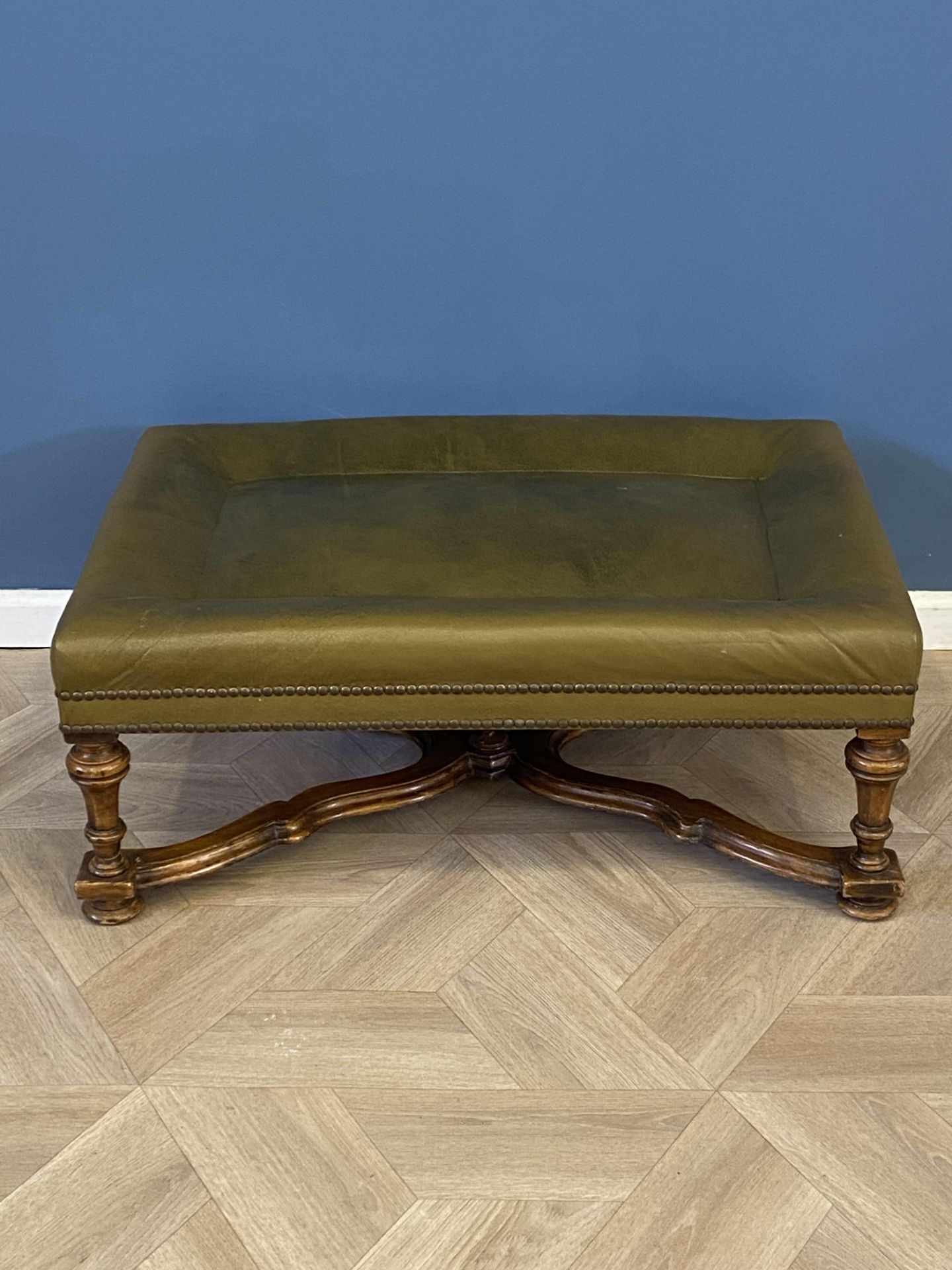 Green leather footstool