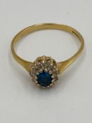 9ct gold ring set with a blue stone