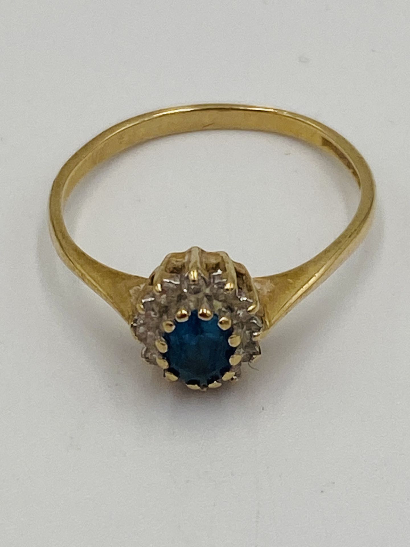 9ct gold ring set with a blue stone