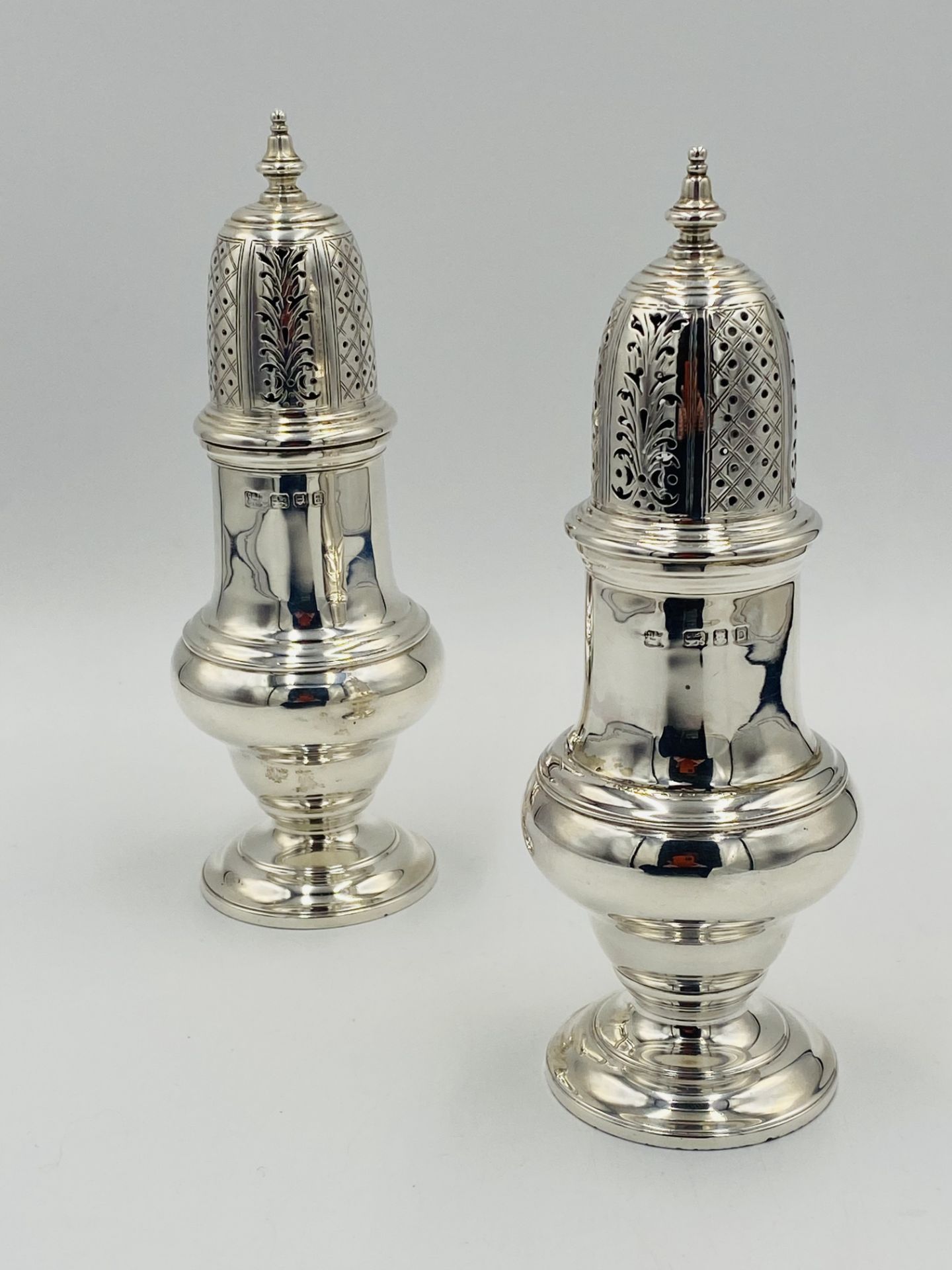 Pair of silver sugar casters