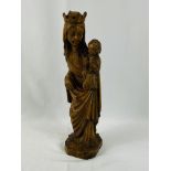 Carved wood figure of a female saint