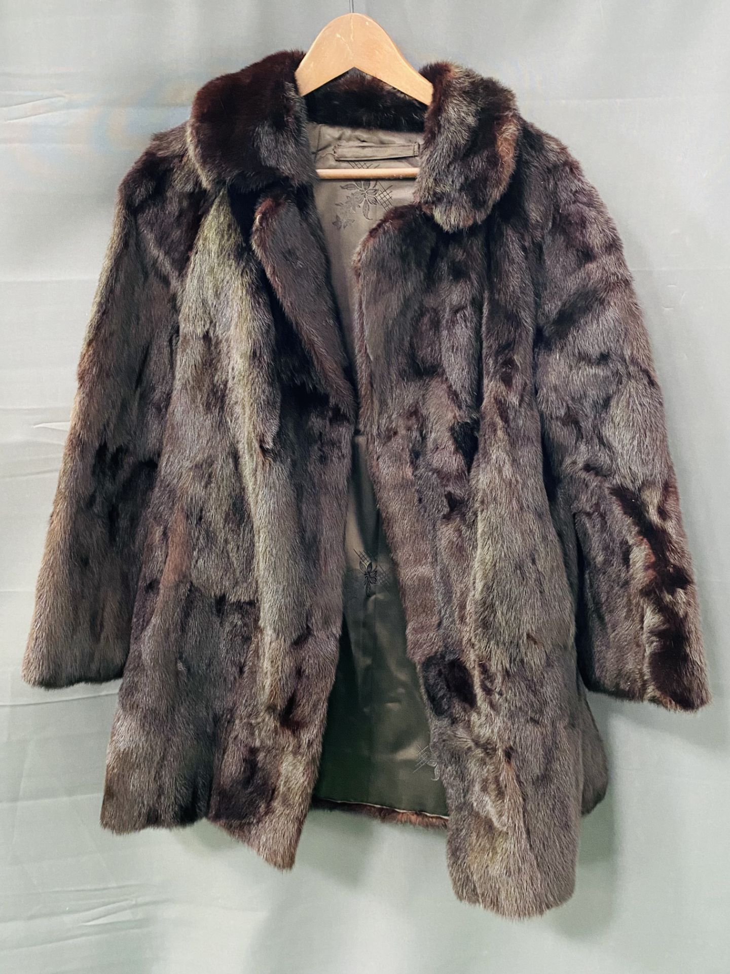 Ladies mink coat together with a fur stole