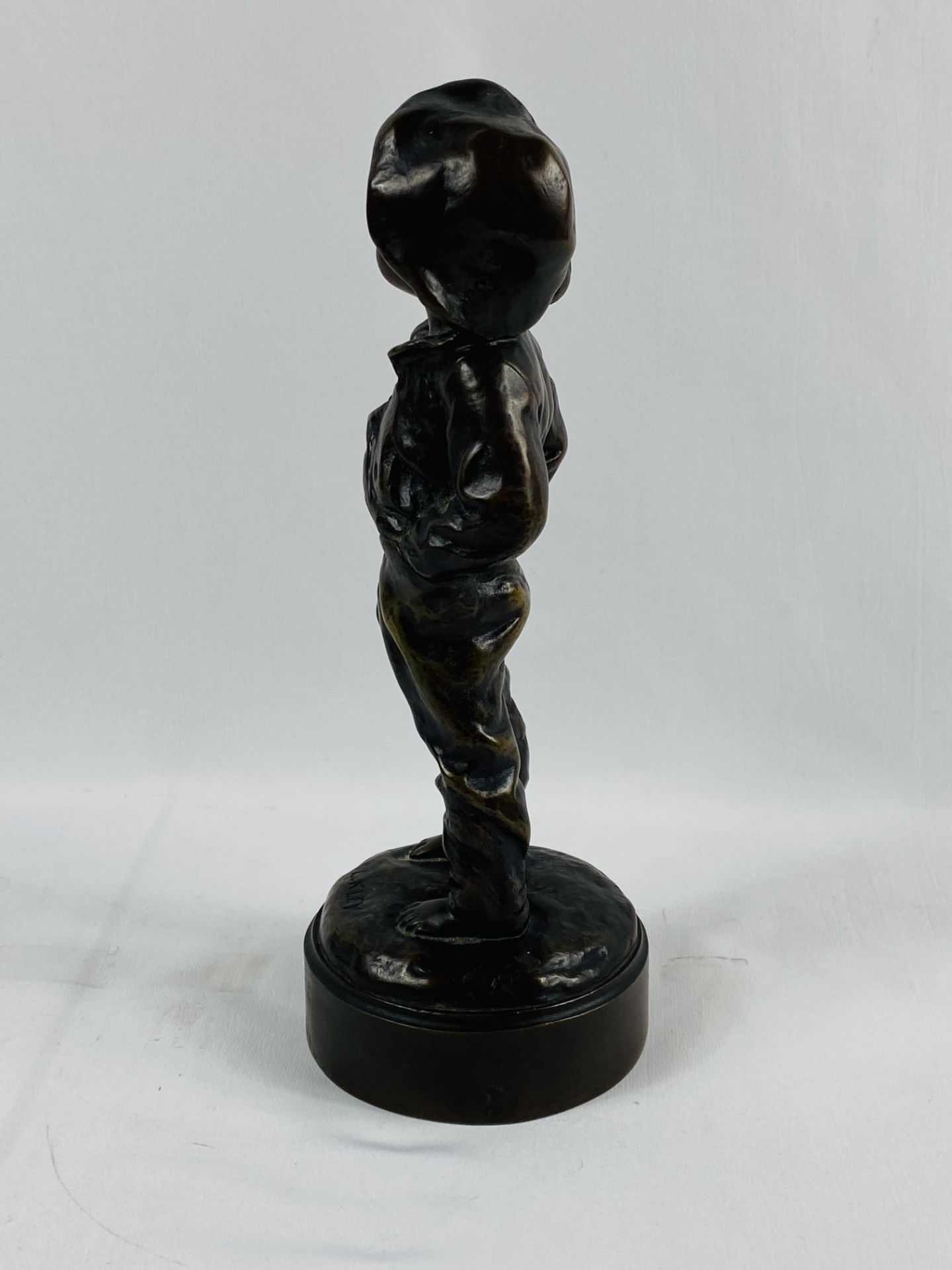 Bronze figure of a boy with hands in his pockets, signed to base L Kley - Image 2 of 7