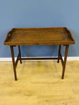 Carved mahogany tray top table