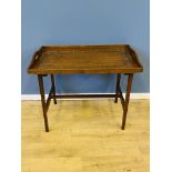 Carved mahogany tray top table