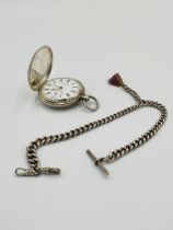 Victorian silver pocket watch together with a silver fob chain