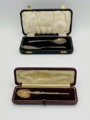 Silver gilt anointing spoon together with a boxed silver spoon and knife