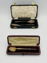 Silver gilt anointing spoon together with a boxed silver spoon and knife