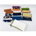 Quantity of fashion sunglasses and cases