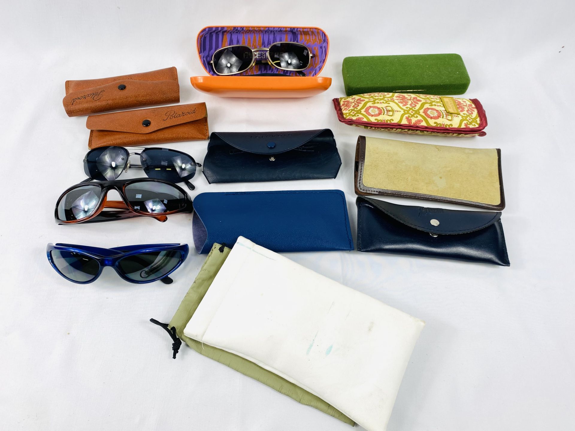 Quantity of fashion sunglasses and cases