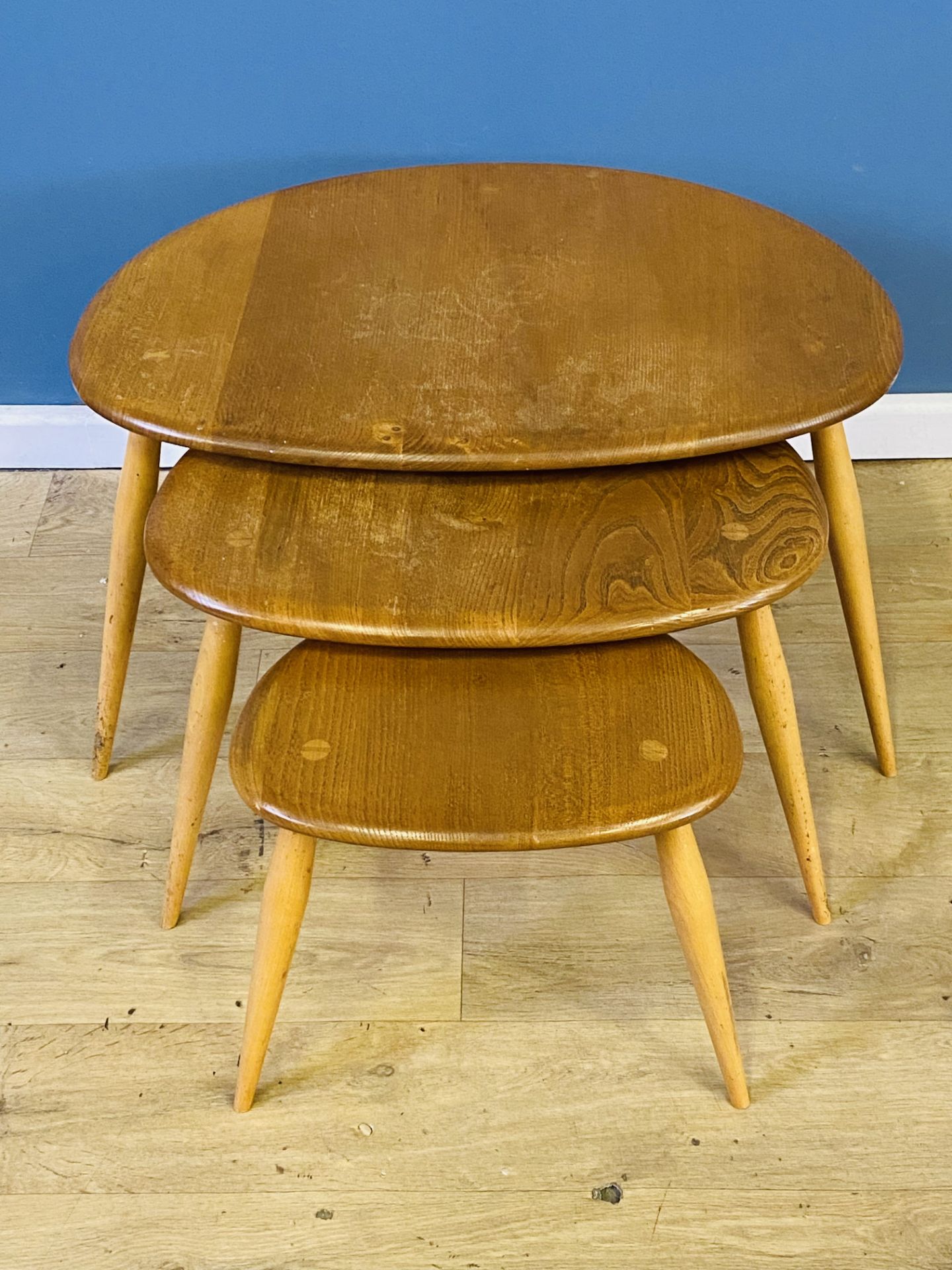 Ercol nest of three 'pebble' tables