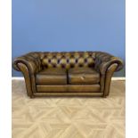 Button back leather two seat Chesterfield sofa