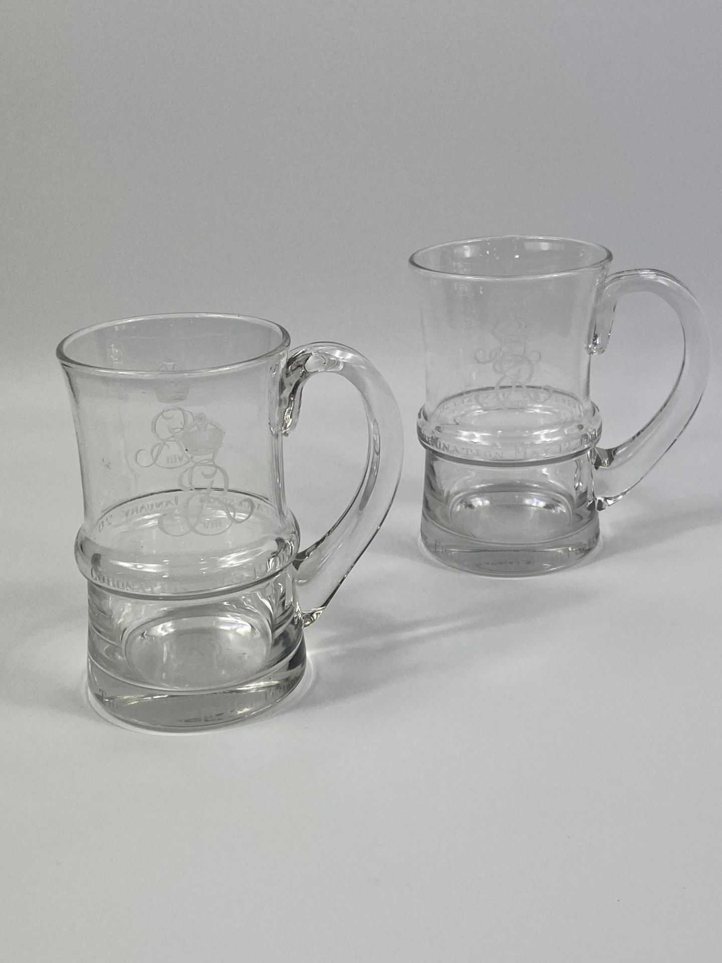 Two limited edition Edward VIII glass tankards retailed by Thomas Goode.