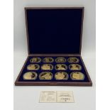 Twelve gold plated Portraits of the Queen Diamond Jubilee coins in presentation box