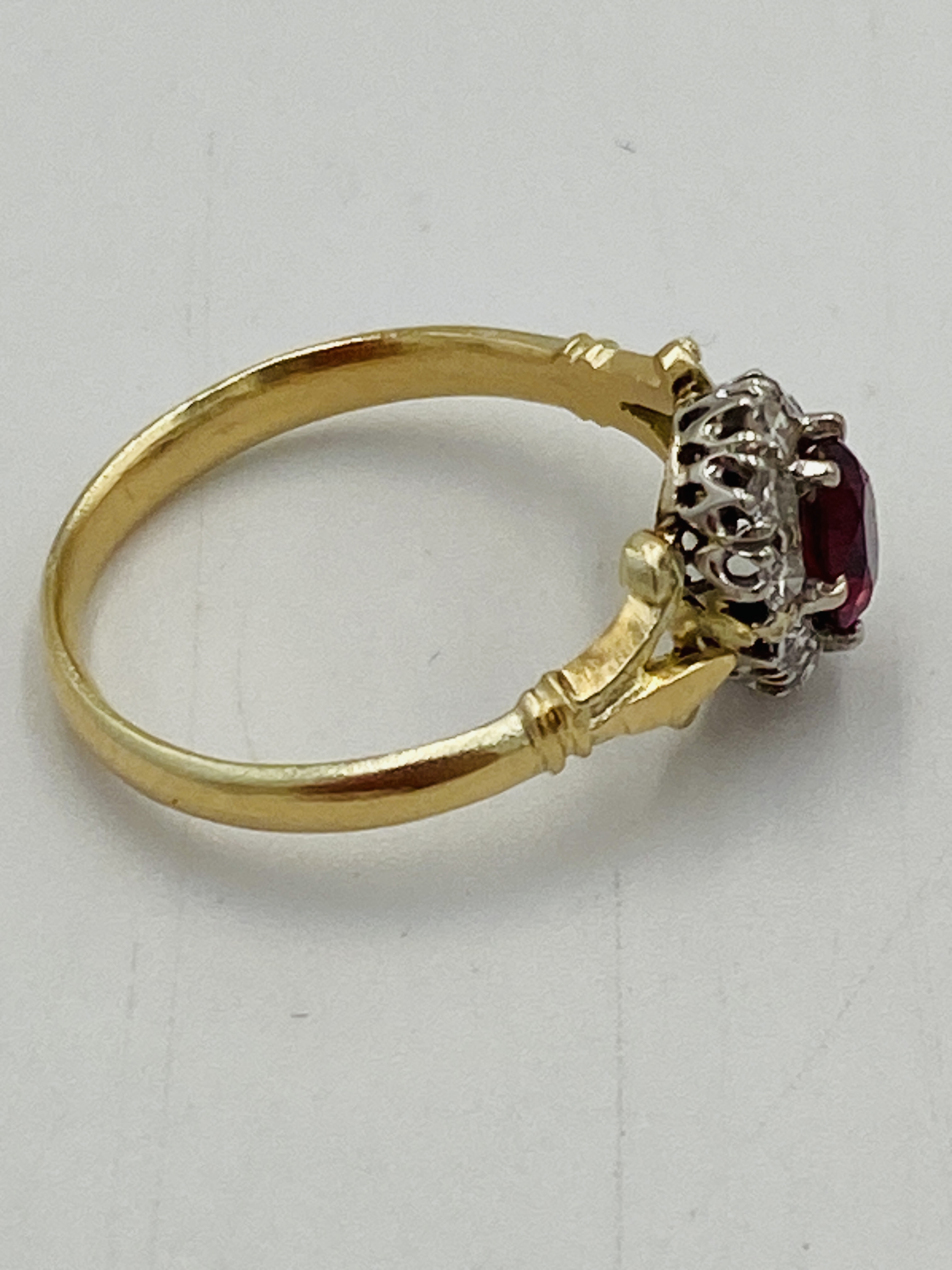 Gold ring set with central ruby and diamond surround - Image 5 of 6