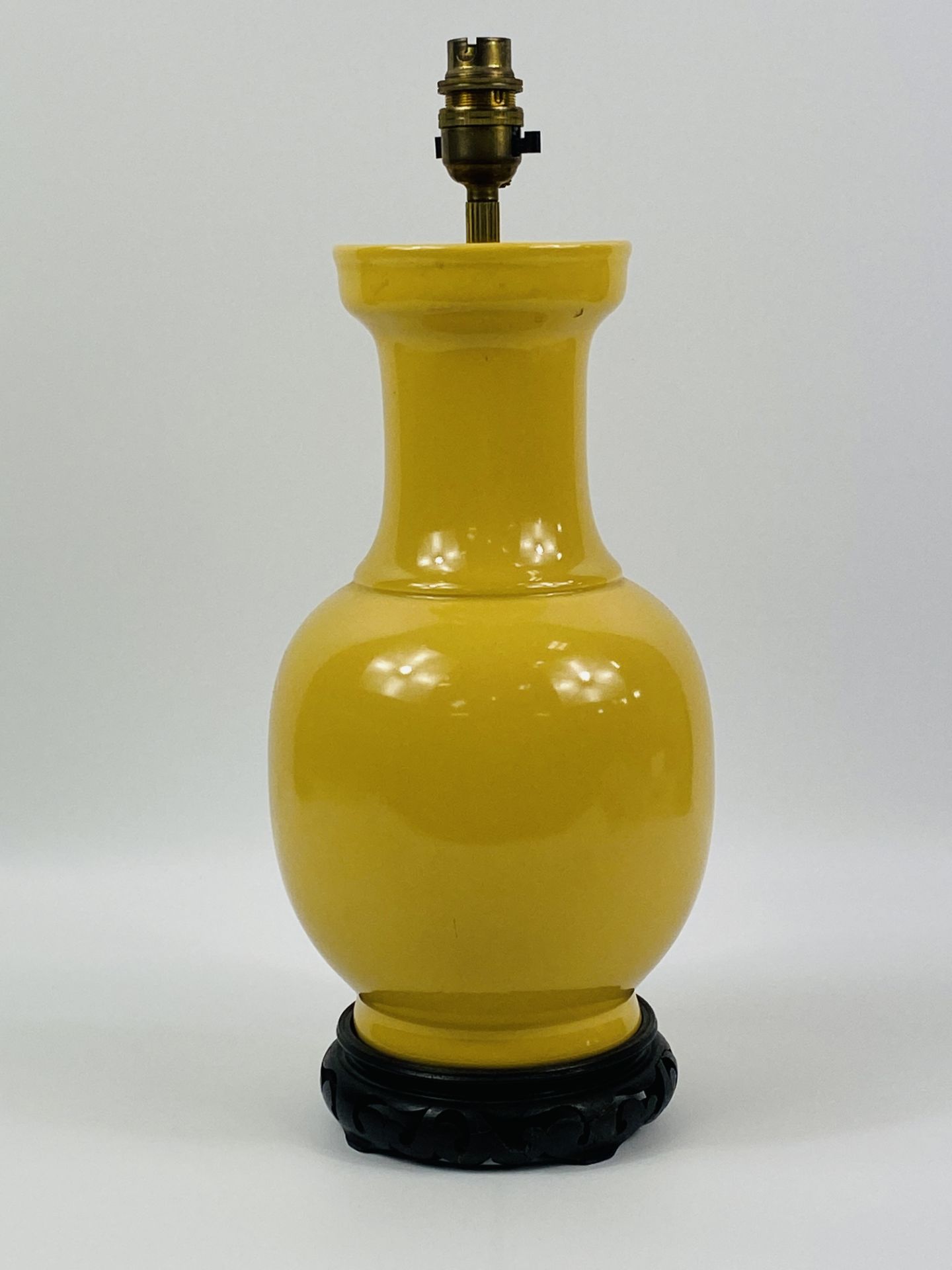 Oriental style ceramic table lamp on wood base