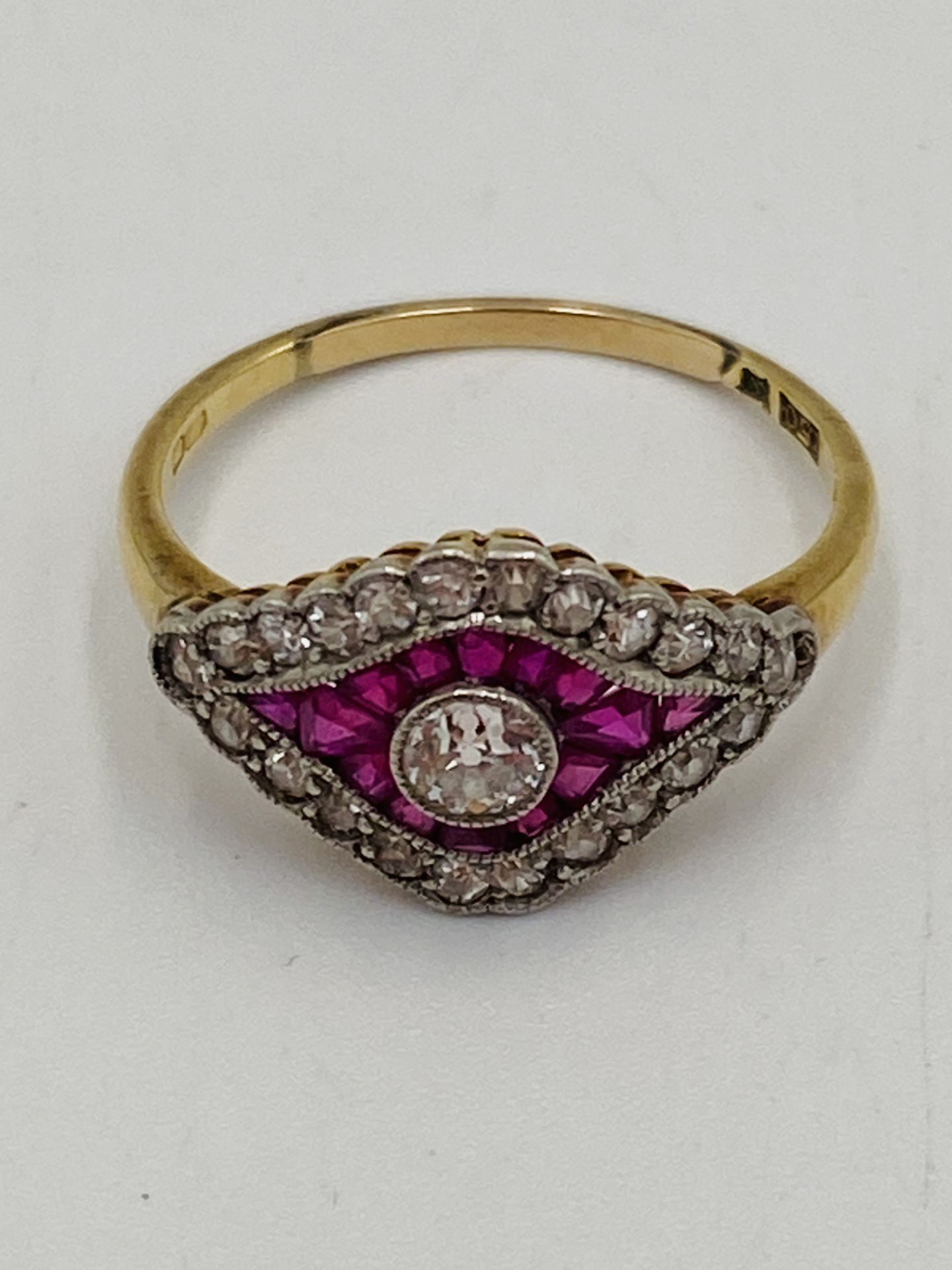 18ct gold ring set with central diamond