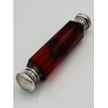 Ruby glass double ended perfume bottle with white metal tops