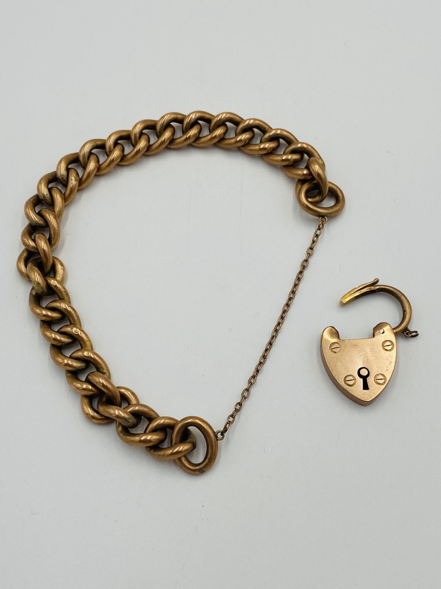 9ct gold bracelet with 9ct gold padlock charm