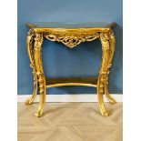 Serpentine carved giltwood console table