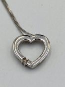 9ct white gold necklace with diamond set pendant