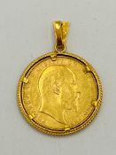 Edward VII 1908 gold sovereign in 14ct gold mount