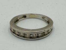 Platinum and diamond half eternity ring