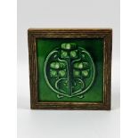 Art nouveau tile in wood frame