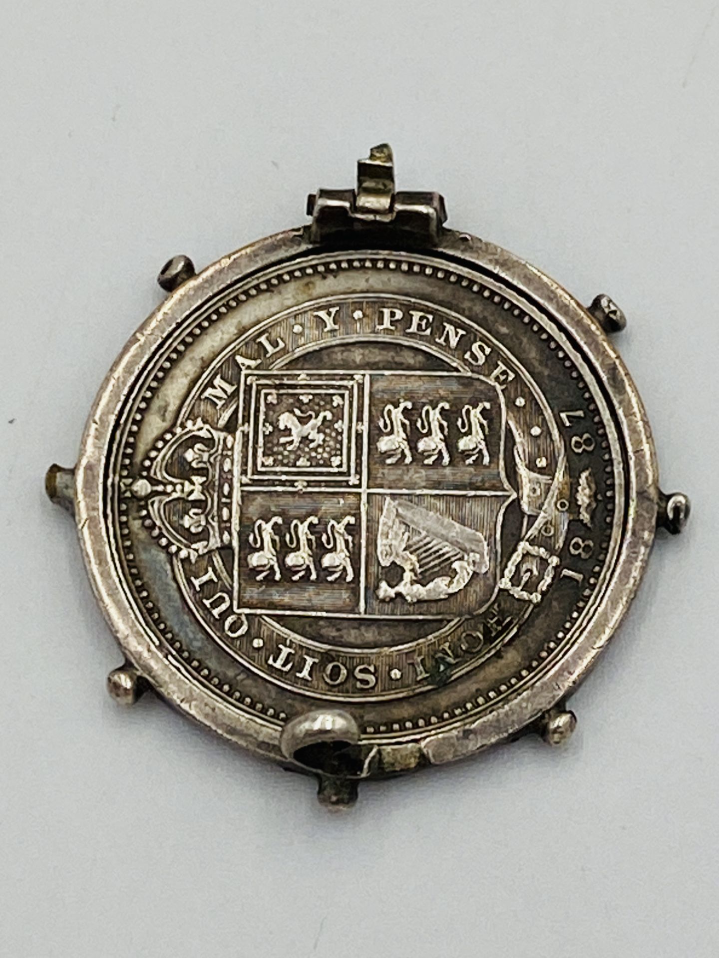 Victorian silver shilling in white metal mount