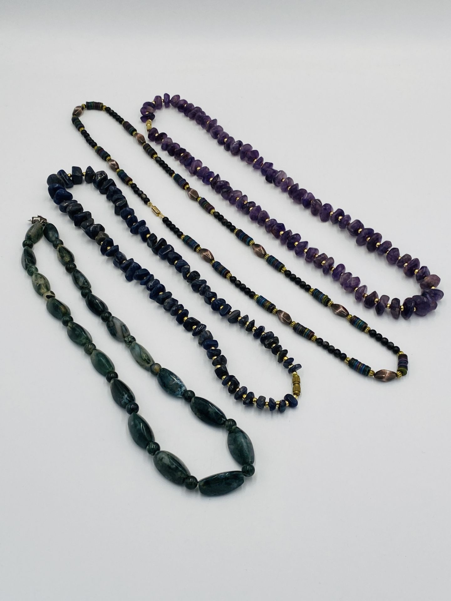 Four agate bead necklaces