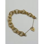 9ct gold bracelet with 9ct gold padlock