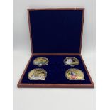 Four gold plated Statue of Liberty coins, each with Certificate of Authenticity