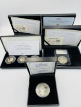 Three collectable coins sets