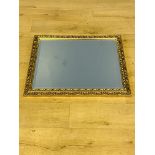 Gilt framed wall mirror