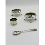 Two silver salts and a silver napkin ring