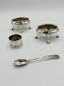 Two silver salts and a silver napkin ring