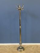 Decorative polished metal coat and hat stand