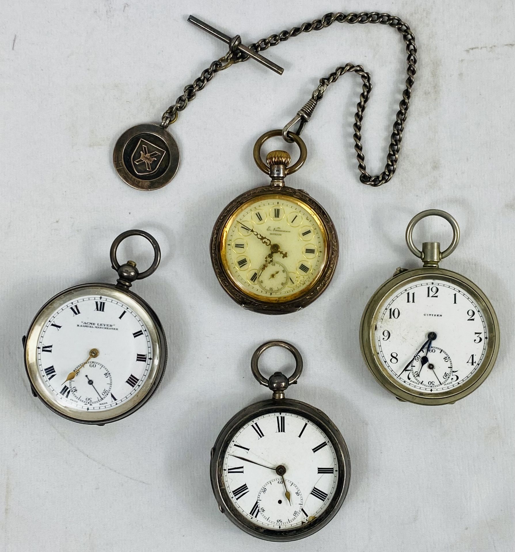 Three silver cased pocket watches, together with another