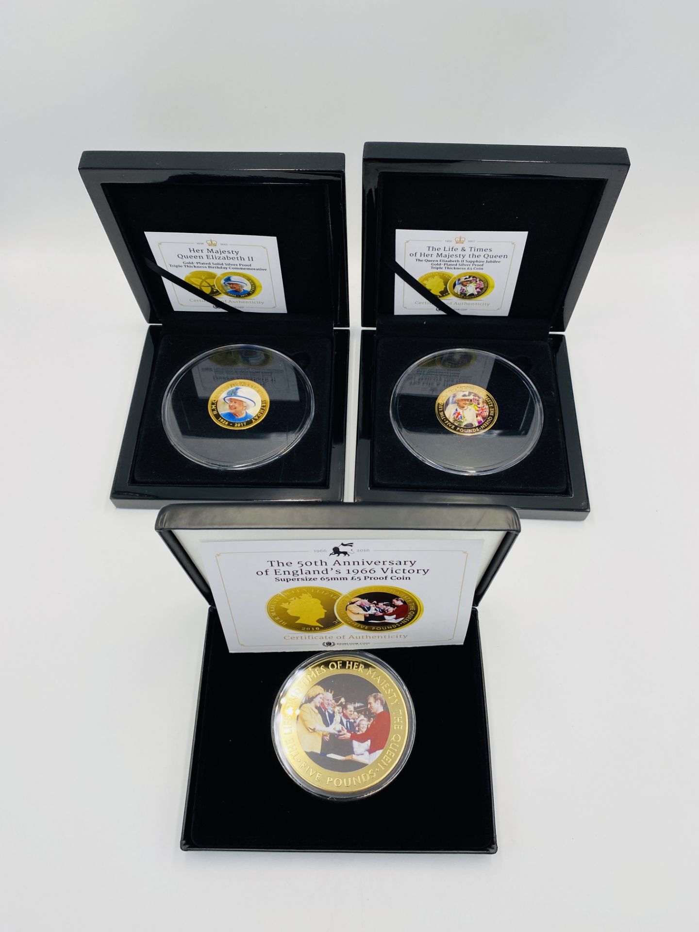 Three gold plated collectable coins