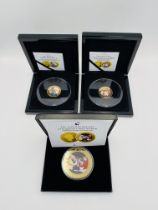 Three gold plated collectable coins